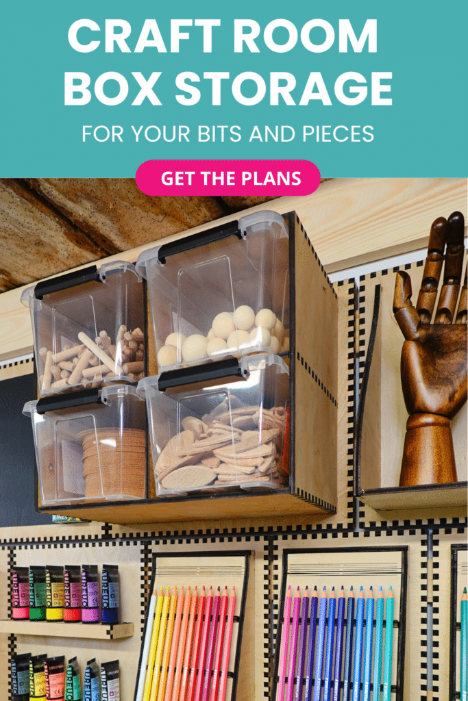 Laser-cut French cleat medium four-box cubby on a plywood wall, holding clear plastic bins filled with wooden dowels, spheres, and biscuits