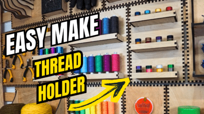 Laser-cut French cleat thread and bobbin holders on a plywood wall, shown at an angle with colorful spools neatly lined on shallow shelves and bold “Easy Make Thread Holder” text overlaid.