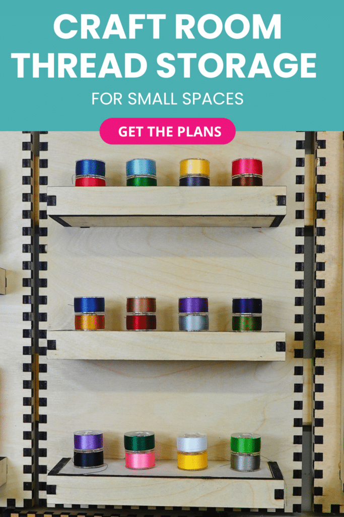 Laser-cut French cleat thread storage shelves on a plywood wall, shown front-on with rows of small colorful thread spools neatly lined up across three tiers.