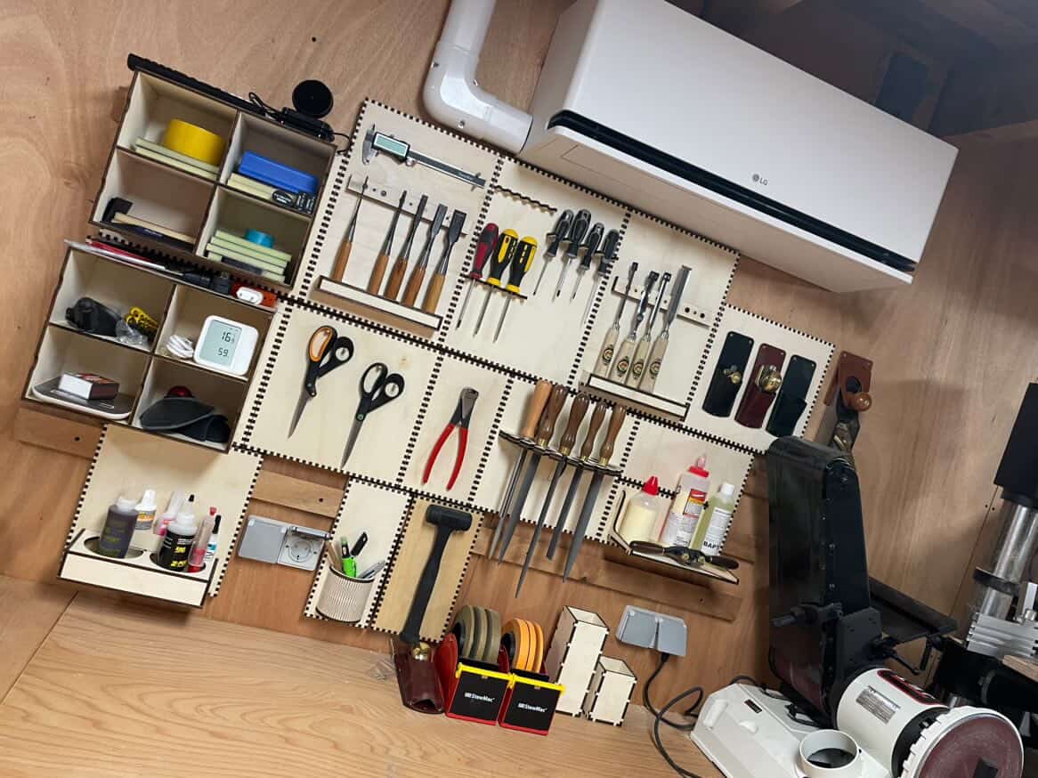 Robbert's first Neat French Cleat tool wall in his guitar-building garage workshop